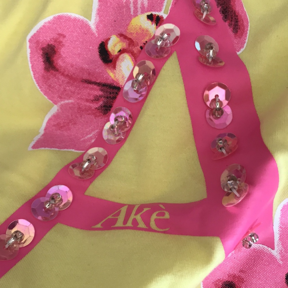 AKE yellow A tee